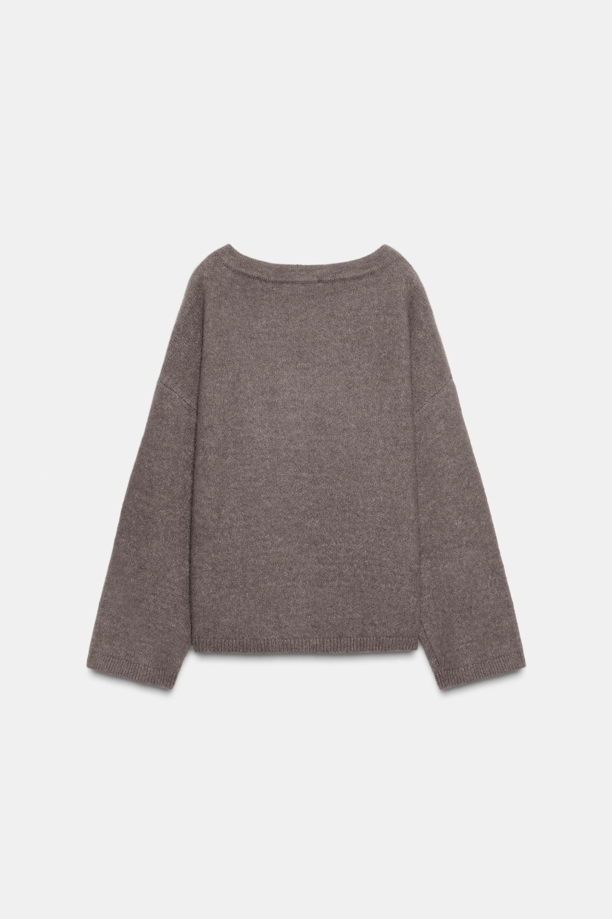 PULL EN MAILLE AVEC FERMOIR
